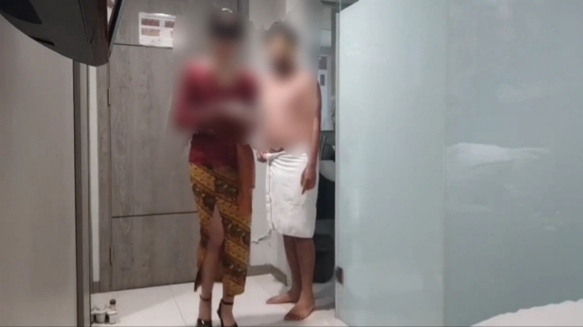 Polda Bali Pastikan Wanita Berkebaya Merah yang Mesum dengan Tamu Hotel bukan di Bali